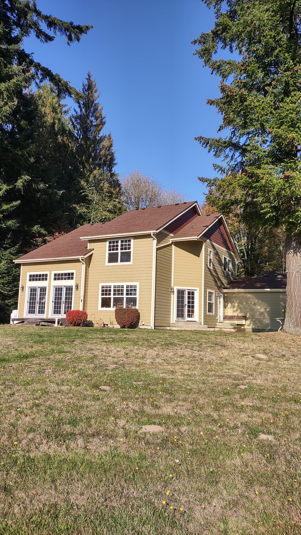 A completed roof on the rear exterior of a two story home